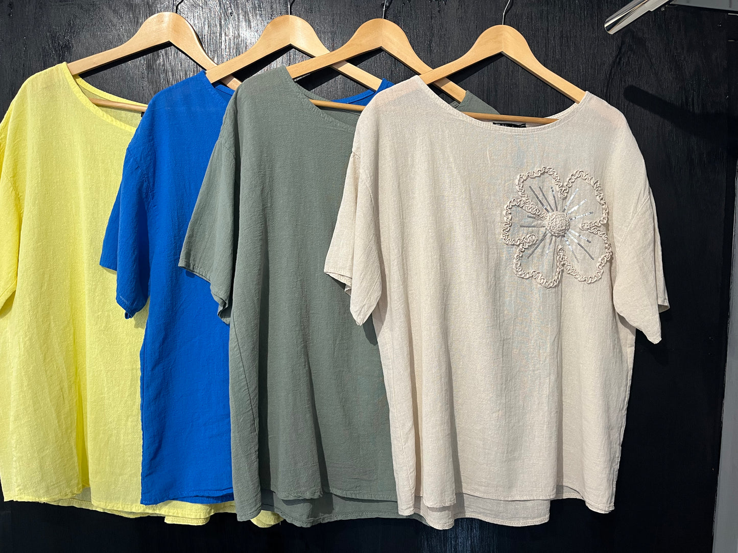 natural cotton top with a sequined floral embellishment