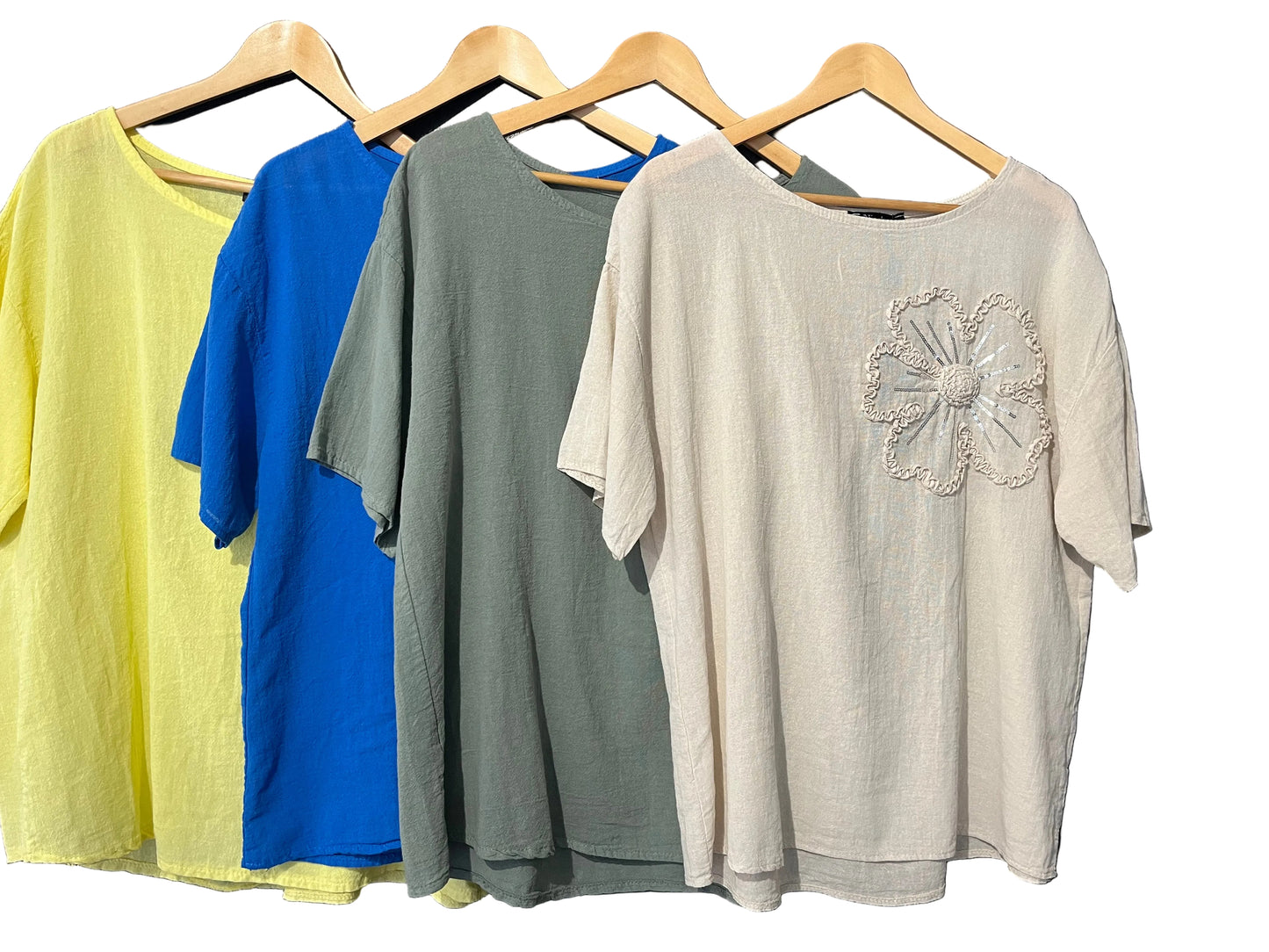 natural cotton top with a sequined floral embellishment