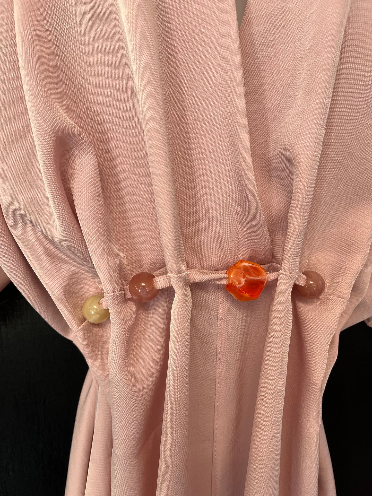 Stylish playsuit with bead embellished belt tie