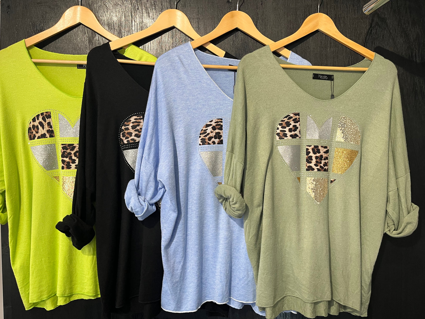 soft knit V neck jumper with embellished foil heart placement print