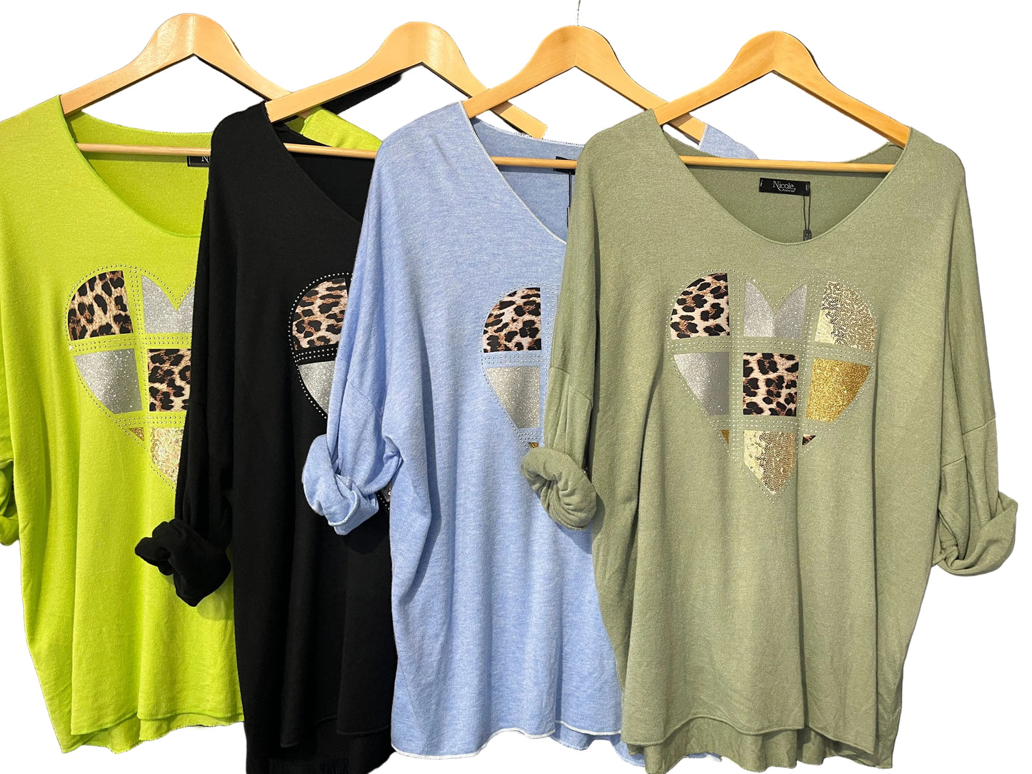 soft knit V neck jumper with embellished foil heart placement print
