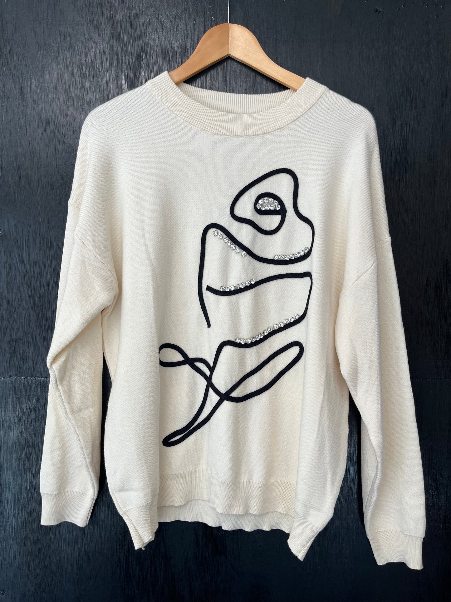 beautiful knitted jumper with floral and crystal stone embellishment