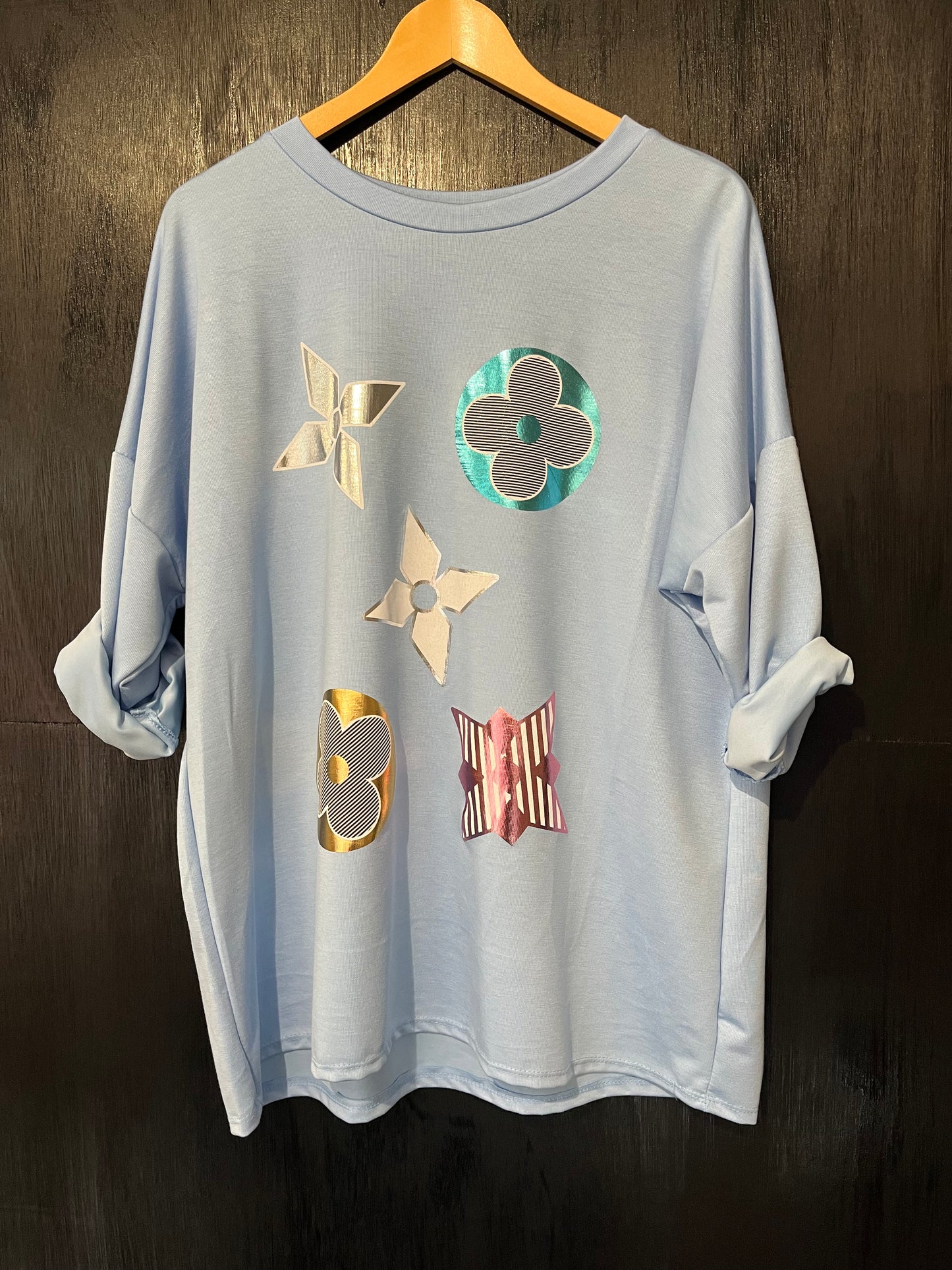 sweat top in scuba fabric top with a foil geometric placement print