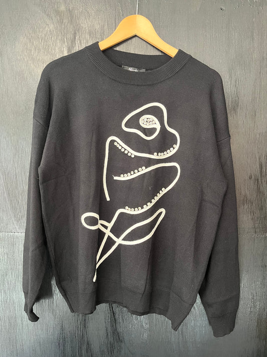 beautiful knitted jumper with floral and crystal stone embellishment