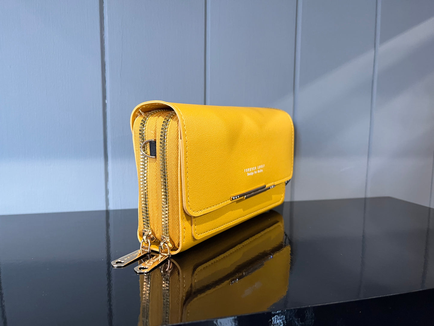 Body cross bag with multiple card slots and phone holder feature