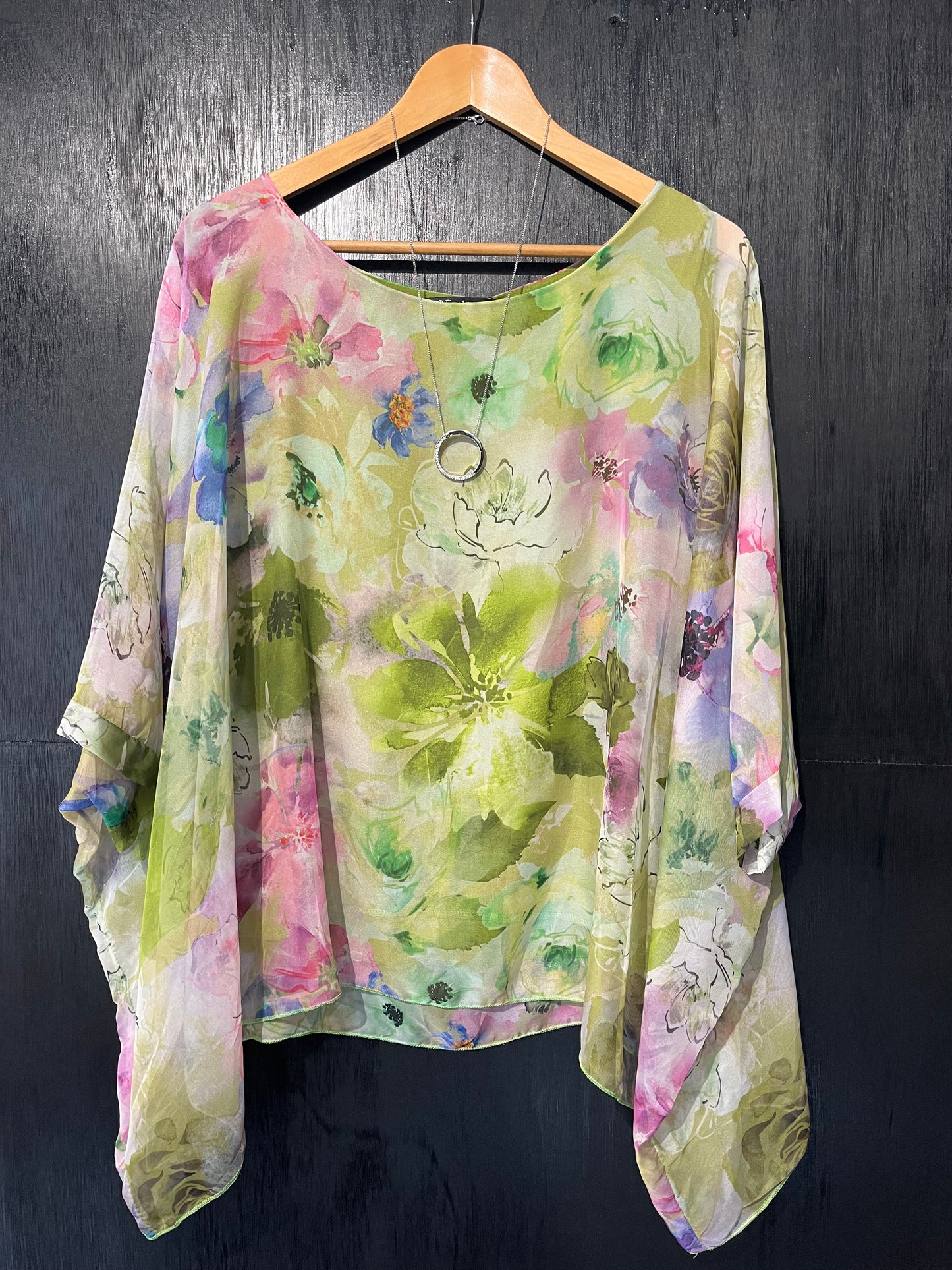 soft printed chiffon cape top with attached lined vest and stunning necklace