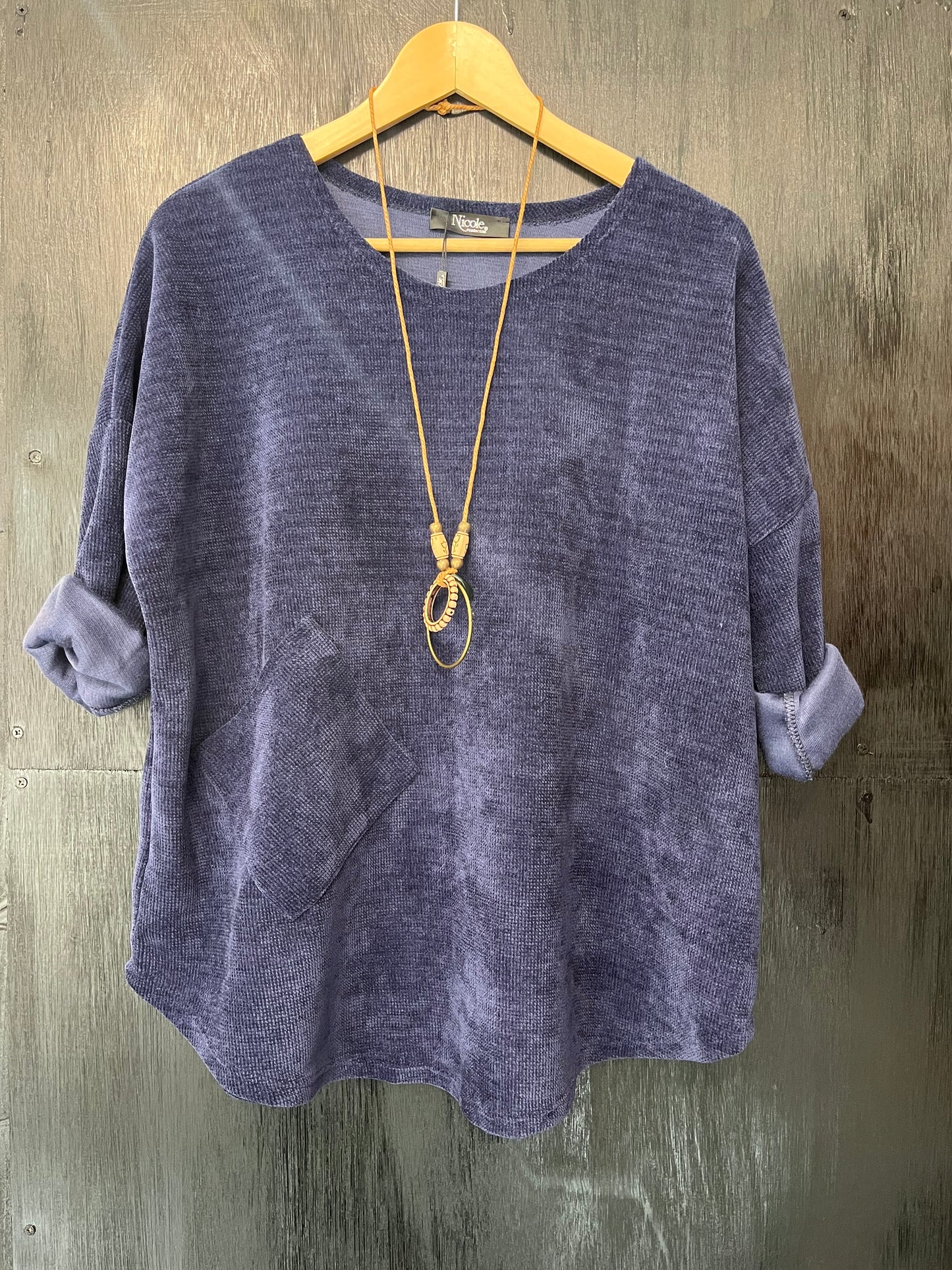 heavy cord style fabric long sleeve jumper with pocket detail and necklace