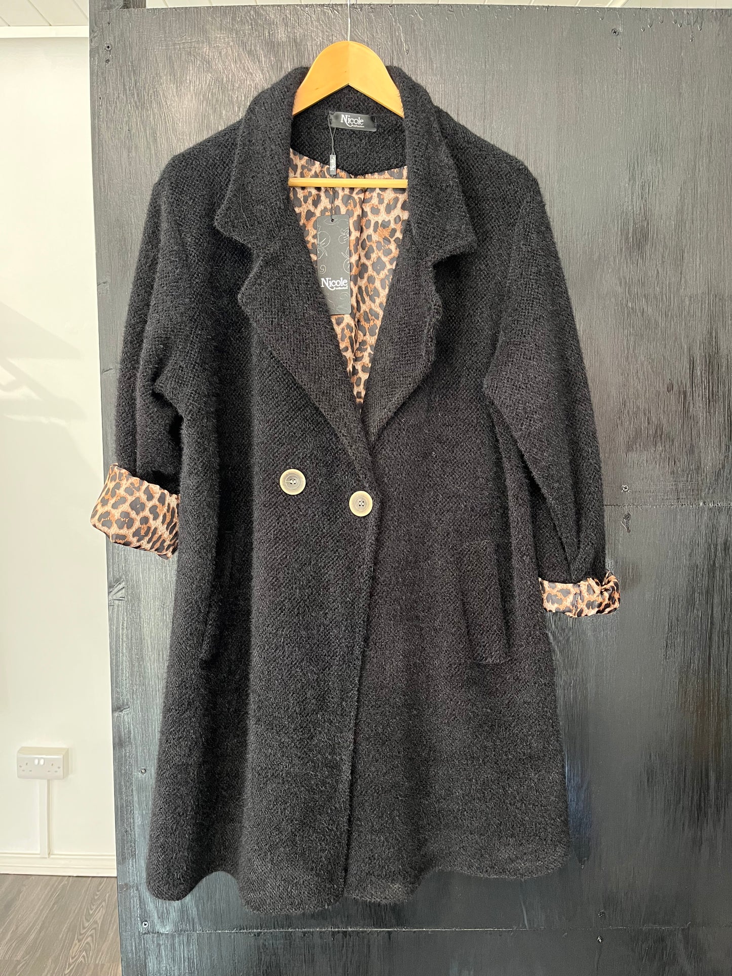 long button front pocket coat with animal print lining