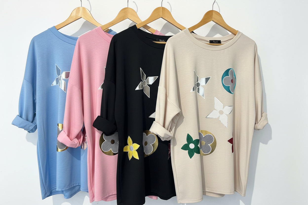sweat top in scuba fabric top with a foil geometric placement print