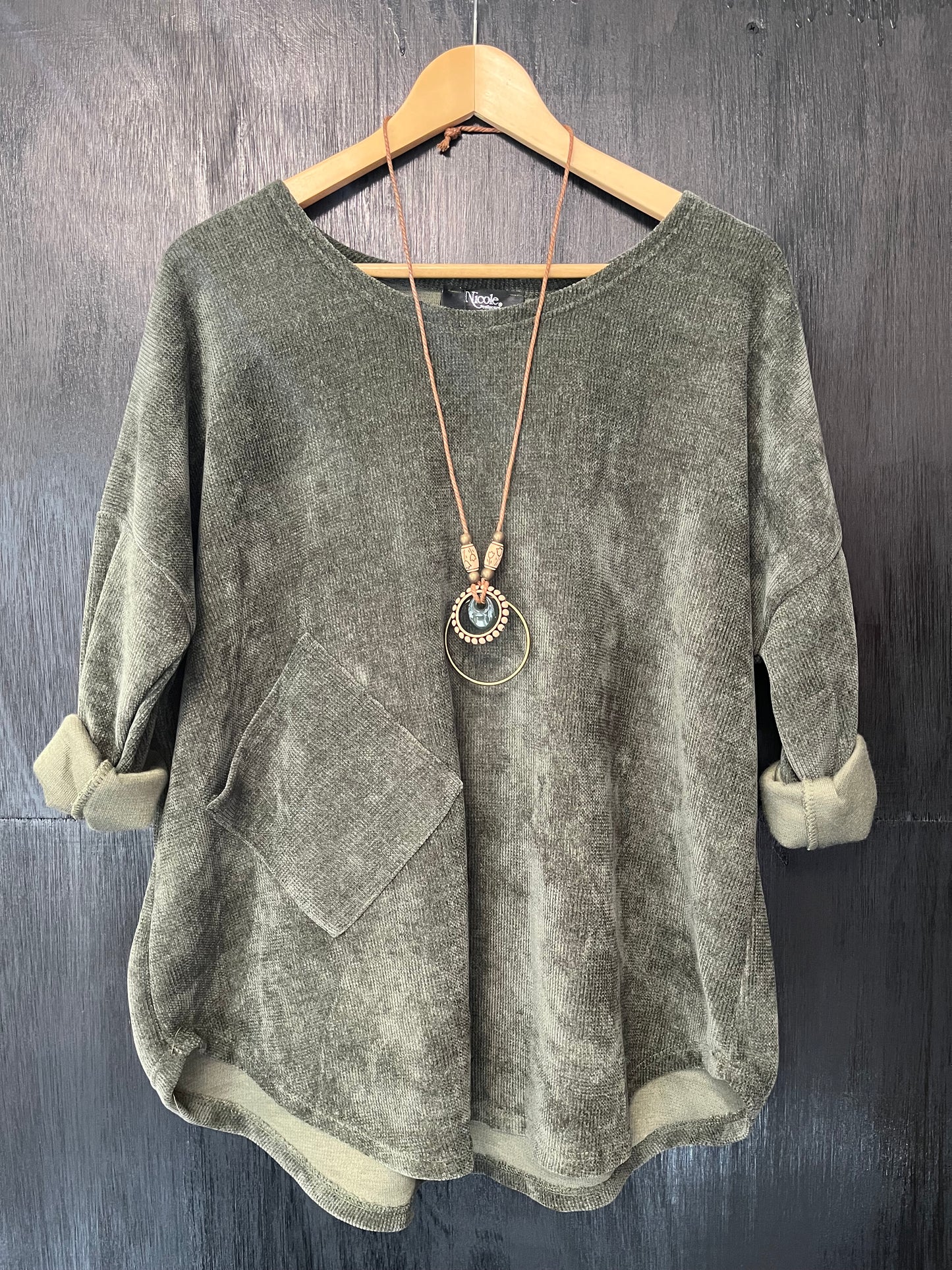 heavy cord style fabric long sleeve jumper with pocket detail and necklace
