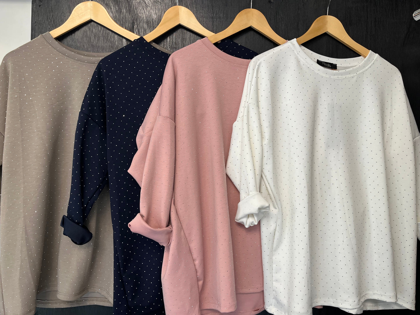 long sleeve sweat top with all over studded embellishment