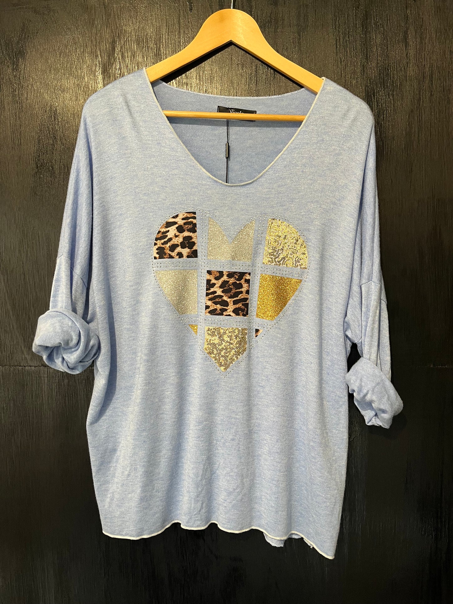 soft knit V neck jumper with embellished foil heart placement print