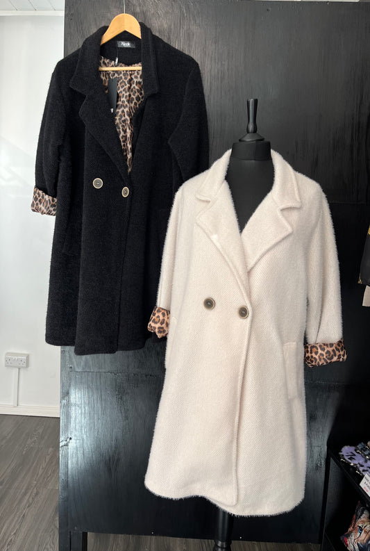 long button front pocket coat with animal print lining