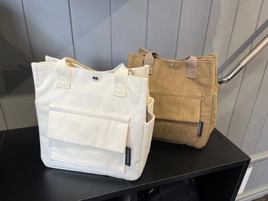Cord handbag with front and side pocket