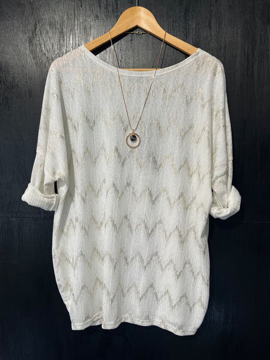 textured top with a zig zag foil design and necklace