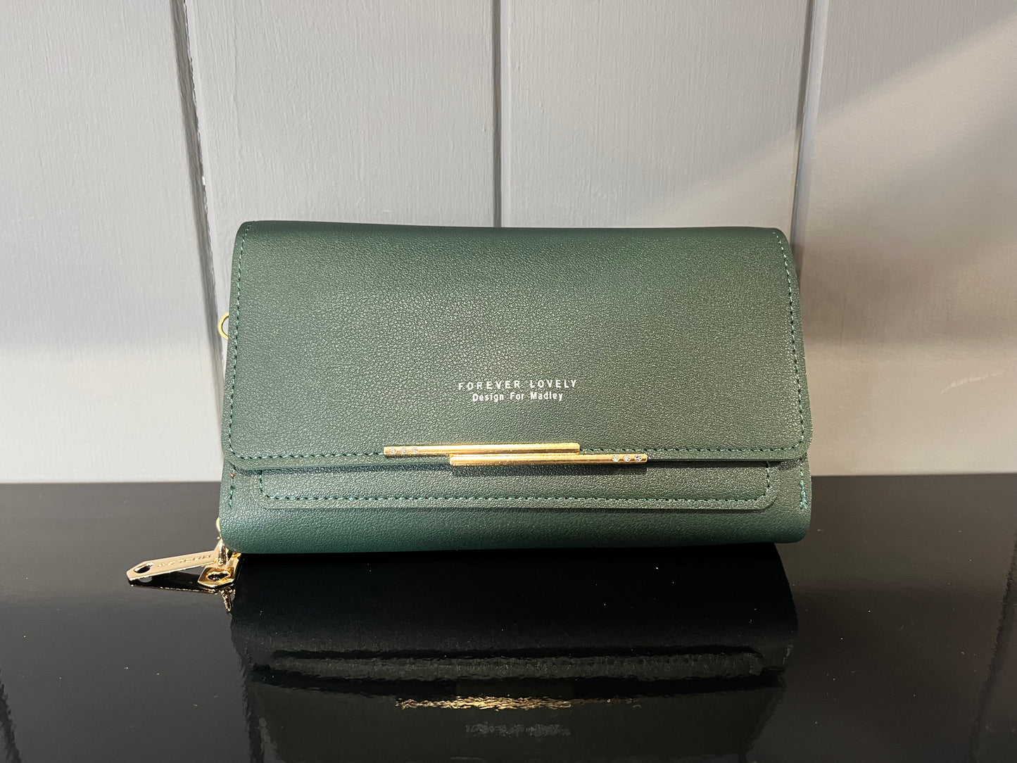 Body cross bag with multiple card slots and phone holder feature