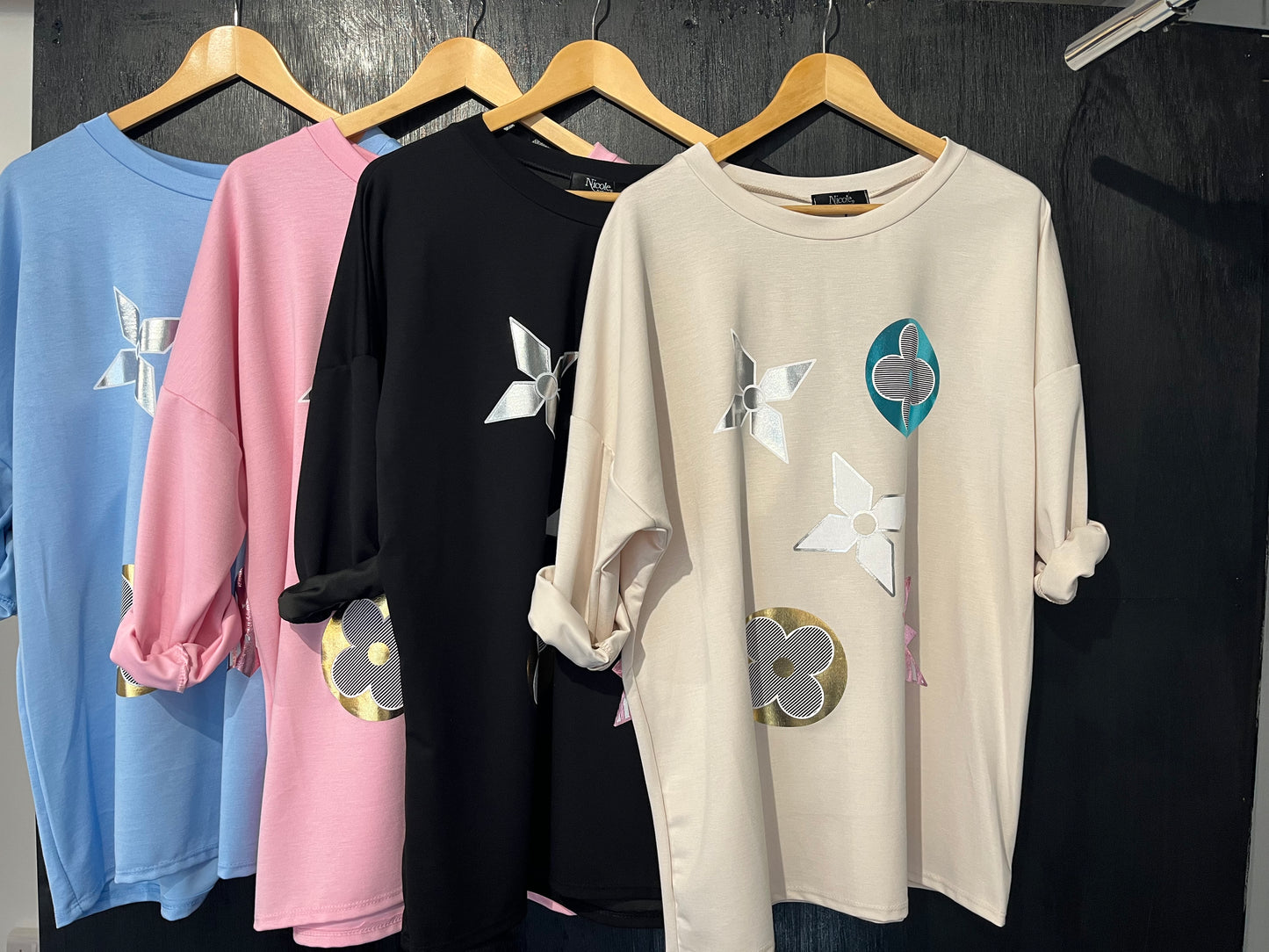 sweat top in scuba fabric top with a foil geometric placement print