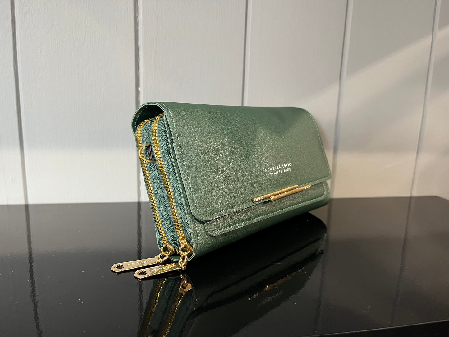 Body cross bag with multiple card slots and phone holder feature