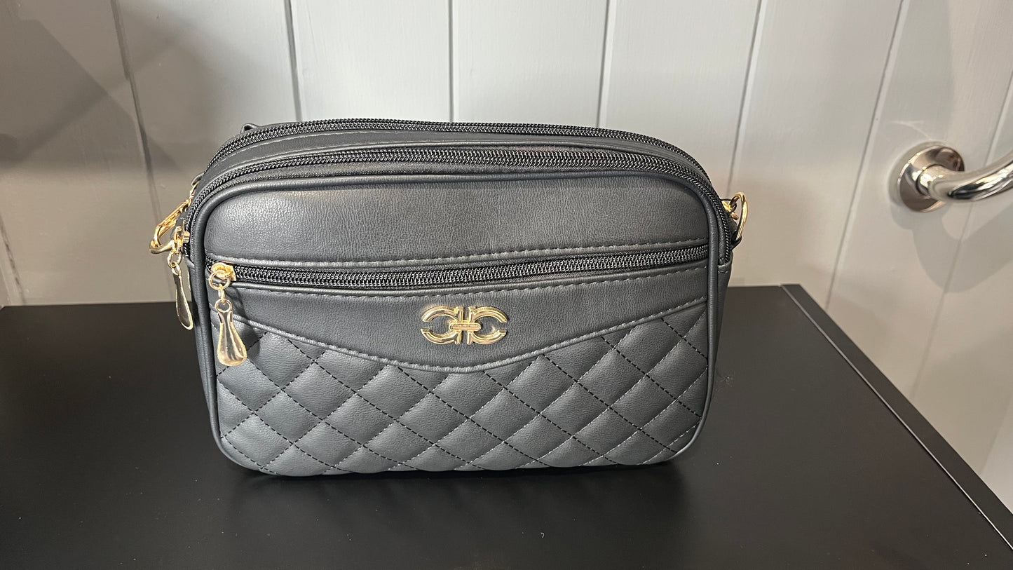 Elegant black quilted crossbody bag