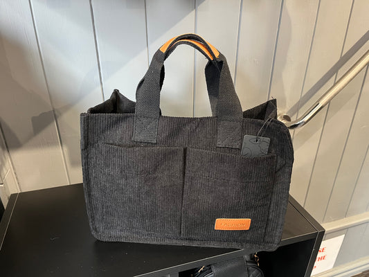 Corduroy tote bag with multiple pockets and a body cross shoulder strap