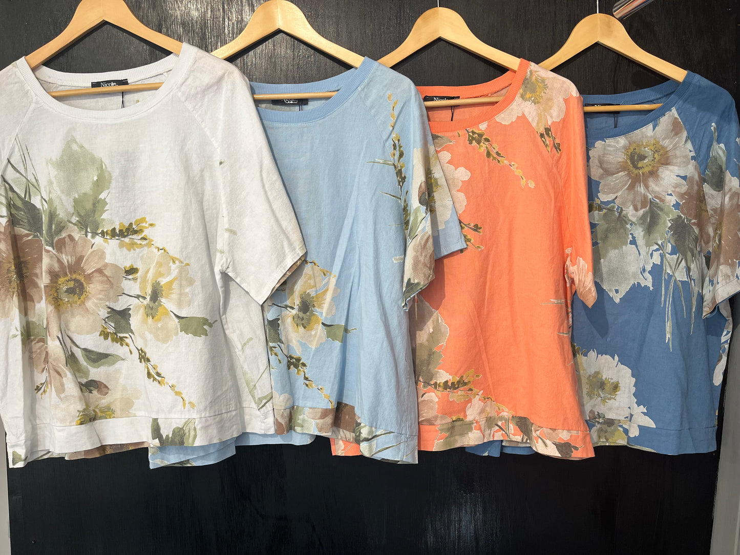 ladies box tee with all over floral print and ribbed neckline